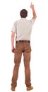 Back view of pointing young men in shirt and jeans Royalty Free Stock Photo