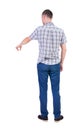 Back view of pointing young men in shirt and jeans. Royalty Free Stock Photo