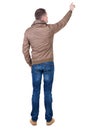 Back view of pointing young men in wind breaker.