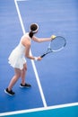 Tennis Player Serving Ball in Court Royalty Free Stock Photo