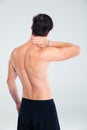 Back view portrait of a man having neck pain Royalty Free Stock Photo