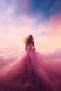 back view of a pretty young woman wearing a long flowing pink dress