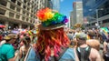 Colorful LGBT Pride March in Urban Setting. Back view of rainbow-clad people. AI Generated Royalty Free Stock Photo