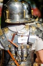 Back view of a Roman legionary with helmet and lorica segmentata armor Royalty Free Stock Photo