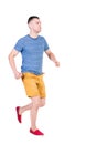 Back view of running man in t-shirt and shorts Royalty Free Stock Photo
