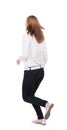 Back view of running woman in jeans Royalty Free Stock Photo