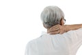 Back view,Senior woman suffering from neck pain,disease of cervical spondylosis,old elderly touching nape or scruff,muscle tension Royalty Free Stock Photo