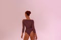 Back view of elegant sexual female ballerina