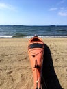 Orange Kayak Ready on Lake Beach Royalty Free Stock Photo