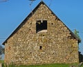 Back view on small old stone farm house Royalty Free Stock Photo