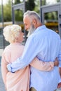 back view of smiling senior couple hugging each other Royalty Free Stock Photo