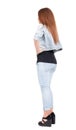 Back view of standing beautiful red head woman. Royalty Free Stock Photo