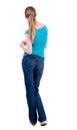 Back view of standing young beautiful blonde woman Royalty Free Stock Photo