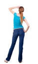 Back view of standing young beautiful blonde woman Royalty Free Stock Photo