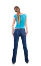 Back view of standing young beautiful blonde woman. Royalty Free Stock Photo