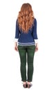 Back view of standing young beautiful redhead woman. Royalty Free Stock Photo