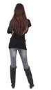 Back view of standing young beautiful woman. Royalty Free Stock Photo