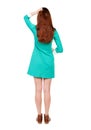 Back view of standing young beautiful woman. The girl in a blue Royalty Free Stock Photo