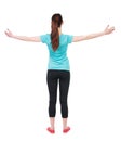 Back view of standing young beautiful woman in in sportswear i Royalty Free Stock Photo