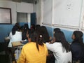 Back view of student in the classroom