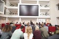 Back view of students at a lecture in a university atrium Royalty Free Stock Photo