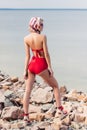 back view of stylish girl posing in red bikini Royalty Free Stock Photo