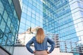 Back view woman looking business building Royalty Free Stock Photo