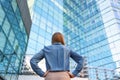 Back view woman looking business building Royalty Free Stock Photo