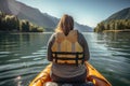 Back view of a super morbidly obese woman in life jacket at inflatable boat