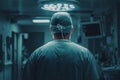 Back view of a surgeon doing a surgical operation at hospital. Royalty Free Stock Photo