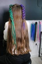 Teenage girl with colored braids