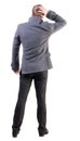 Back view of thinking business man in coat