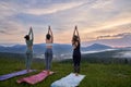 Three fitness women enjoying outdoors meditation Royalty Free Stock Photo