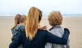 Back view of three generations female looking at sea Royalty Free Stock Photo