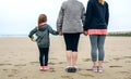 Three generations female watching the sea Royalty Free Stock Photo