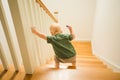 Toddler boy first time n his life going down the stairs Royalty Free Stock Photo