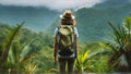 back view of a tourist with a backback, blurred distant rainforest and mountains background Royalty Free Stock Photo