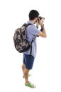 Back view of tourist photographer man taking picture Royalty Free Stock Photo