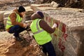 Two Workers Marking Granit Blocks