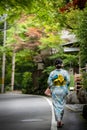 Back view of woman wearing Japanese yukata summer kimono