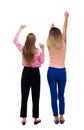 Back view of two young women dancing.