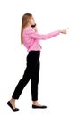 Back view of walking business woman . beautiful girl going, poi Royalty Free Stock Photo