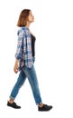 Back view of walking woman. Royalty Free Stock Photo