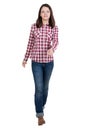 Back view of walking woman in checkered shirt. Royalty Free Stock Photo