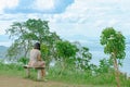 Back view of woman enjoy with beautiful scenery view of nature with a large reservoir above the Srinagarind Dam at Rai Ya Yam view