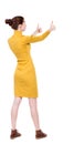 Back view of woman thumbs up. Royalty Free Stock Photo