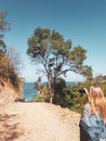 Woman tourist doing photo on the tropical island