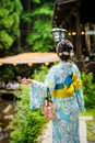 Back view of woman wearing Japanese yukata summer kimono