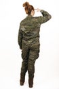 Back view of a woman wearing military uniform giving a military hand salute