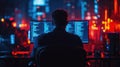 Back View of IT Worker Sitting at Desk and Working on Computer - Programmer or Coder Engaged in Programming Tasks